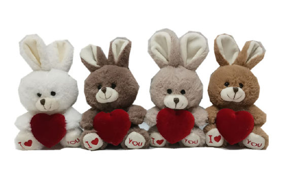 O luxuoso macio do dia de Valentim da tintura do laço brinca 4 coelhos de CLR com coração vermelho