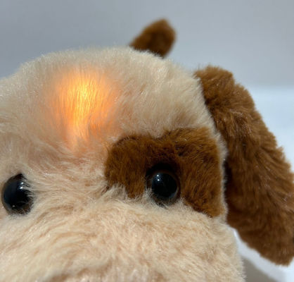Filhinho de brinquedo de pelúcia com função de música de iluminação